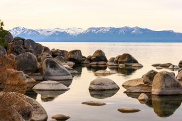 Tranquil Tahoe Beauty: 4K Image of Lake Tahoe View from Lakeshore with Stone and Sky