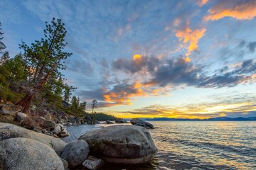 Tranquil Tahoe Beauty: 4K Image of Lake Tahoe View from Lakeshore with Stone and Sky