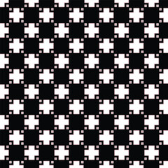 A black and white pattern with white crosses