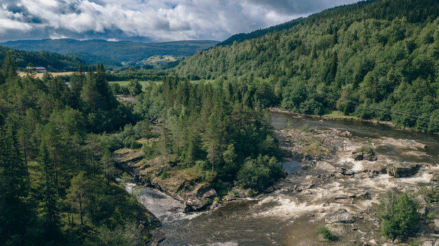 Aerial view of a salmon river in Norway created without Ai