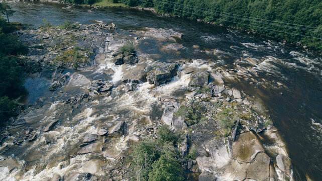 Aerial view of a salmon river in Norway created without Ai