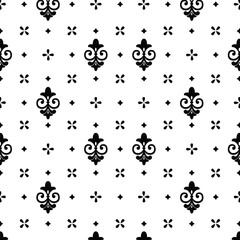 A black and white pattern with fleurons