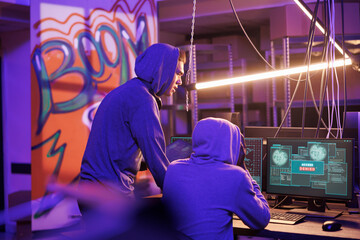 Hackers getting access denied on server while using malware on computer. Unhappy criminals in hoods...