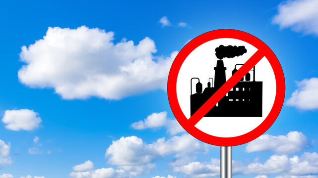 Strikethrough factory symbol. CO2 emission ban concept. Closure of industrial enterprise. Crossed out factory on road sign. Plants ban symbol on background sky. Metaphor deindustrialization. 3d image