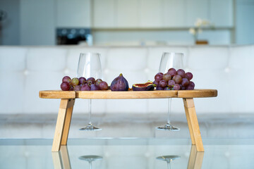 To celebrate a holiday. Wine table with snacks and wine