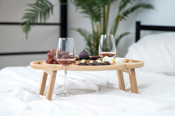 Breakfast in bed. Romantic morning. Love scene