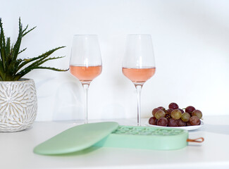 Romantic table. Drink wine and eat grapes