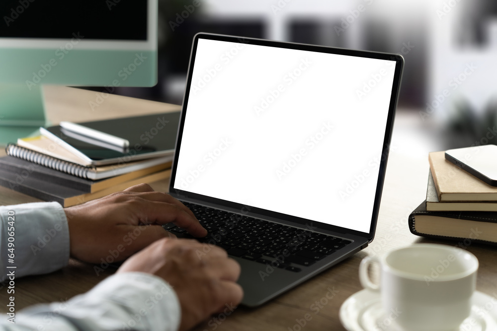 Poster young man working businessman using a desktop computer of the blank screen