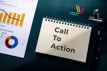 There is notebook with the word Call To Action. It is as an eye-catching image.