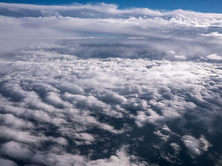 Clouds of different shapes in the sky