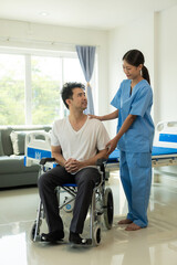 Obraz premium Asian male patient lies in bed while doctor examines and inquires about illness, female nurse writes health checklist at concept hospital Health insurance and hospital services