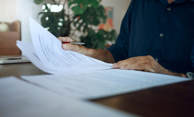 Businessman in casual clothes reviewing document reports on desk. legal expert work part time or...