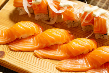 salmon sushi on a board