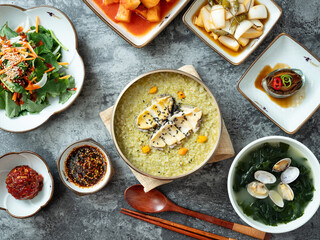 Abalone porridge, clam seaweed soup, and various side dishes	