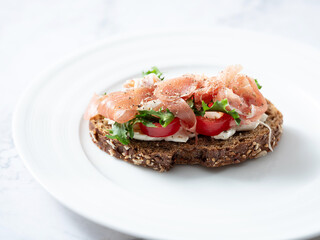 mini open sandwiches on a plate	