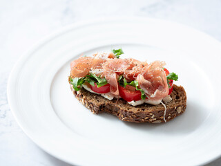 mini open sandwiches on a plate	