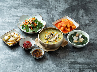 Abalone porridge, clam seaweed soup, and various side dishes