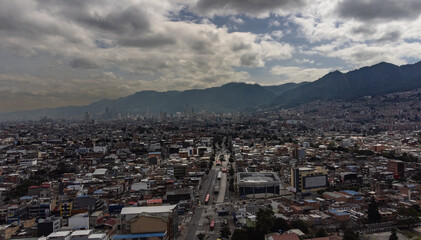 Aerial view of caracas avenue in Bogotá with the eastern mountains and buildings in the background...