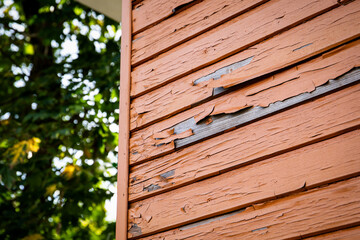 Cracked and peeling paint. Building facade and exterior