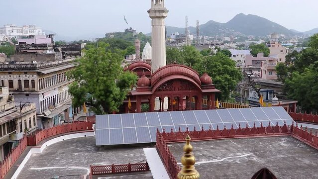 ancient holy jain trample entrance with cloudy sky and mountain background