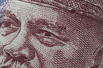 Extreme close up of Malaysian Ringgit currency in the form of 100 Ringgit notes