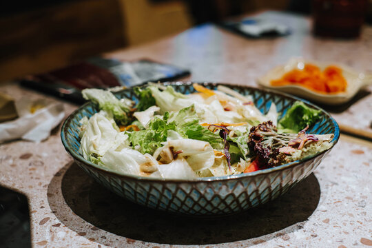 A set of salads in a bowl. Vegetarian or vegan. Selective focus.