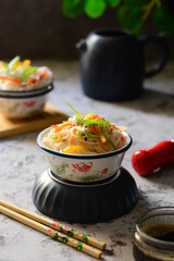 Noodles with vegetables, Asian food, food on dark background