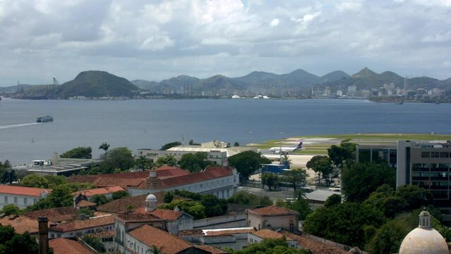 Santos Dumont Airport In Rio de Janeiro, Guanabara Bay, Brazil. Aerial Pan Right 