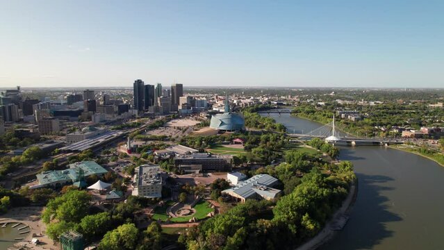 Panoramic aerial of downtown Winnipeg, Red River and the Forks, 4K