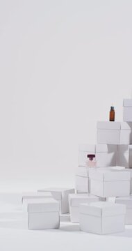Vertical video of beauty products with white cardboard boxes with copy space over white background