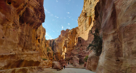 The Siq, narrow gorge, the entrance passage leading to the historical and archaeological city, Petra UNESCO World Heritage Site