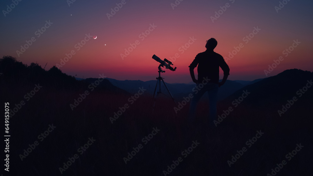 Canvas Prints astronomer looking at the stars, planets, moon and celestial objects with a telescope.