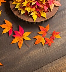 Obraz premium Colorful autumn leaves on a wooden table, change of seasons, golden autumn