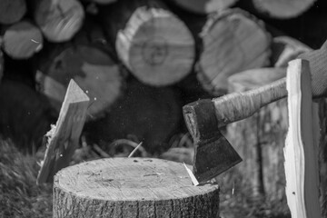 Photography on theme big steel axe with wooden handle