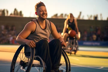  Disabled man on a wheelchair playing basketball © David