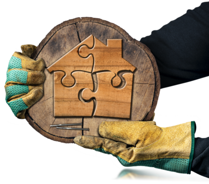 Hands with protective work gloves holding a cross section of a tree trunk with a small wooden house formed from jigsaw puzzle pieces. Isolated on white or transparent background. Png.