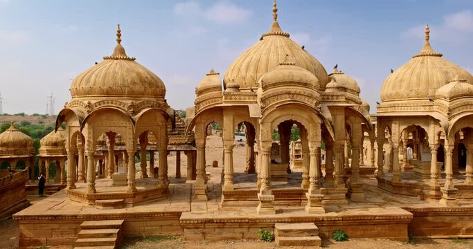 Bada bagh cenotaphs (Hindu tomb mausoleum) made of sandstone in Indian Thar desert. Jaisalmer, Rajasthan, India, Asia