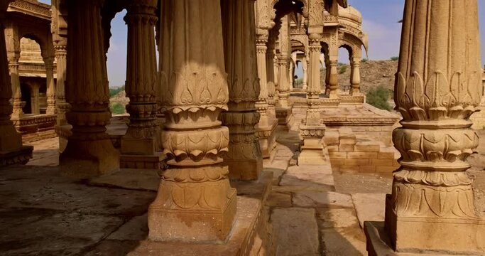 Bada bagh cenotaphs (Hindu tomb mausoleum) made of sandstone in Indian Thar desert. Jaisalmer, Rajasthan, India, Asia