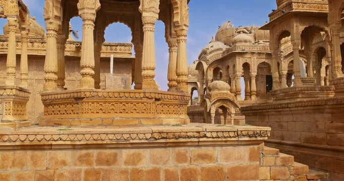 Bada bagh cenotaphs (Hindu tomb mausoleum) made of sandstone in Indian Thar desert. Jaisalmer, Rajasthan, India, Asia