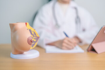 Doctor with Breast Anatomy model. Breast Augmentation Surgery, October Breast Cancer Awareness...