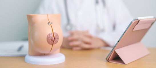 Doctor with Breast Anatomy model. Breast Augmentation Surgery, October Breast Cancer Awareness...