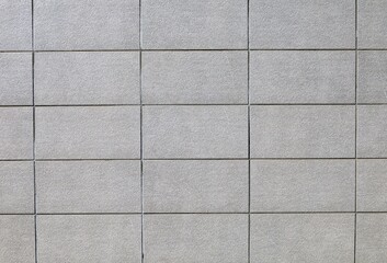 Elegant gray rectangle stone tiles for outdoors. Background and texture