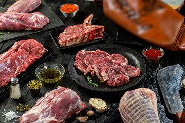 Collection of fresh tender beef on black background, shank meat, flank meat, rib meat ,chuck meat,...