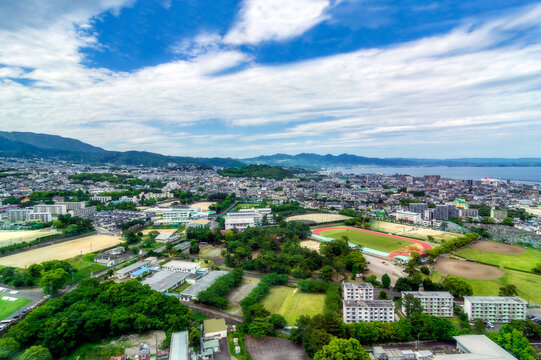 Japan, Oita Prefecture, Beppu, Aerial view of clouds over city on Kyushu island