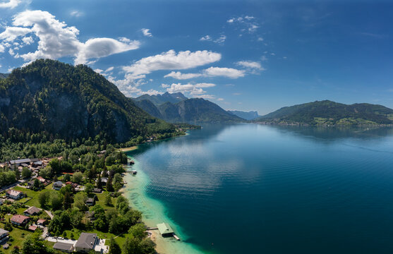 Austria, Upper Austria, Weissenbach am Attersee, Drone view of Lake Atter and surrounding village in summer