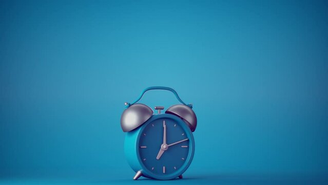 Abstract loop animation of ringing alarm clock on blue background