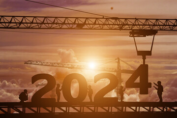 Silhouette staff works as a to prepare to welcome the new year 2024