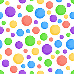 Multi colored circle shapes or bubbles seamless pattern of saturated yellow, purple, blue, red and green color. Bright rainbow baby print. Vector illustration for fabric or wrapping paper design.