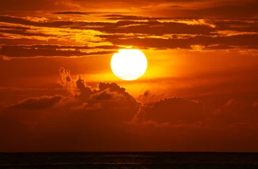 Fotobehang Donkerrood Amazing big sun in sunset sky, Majestic sunset clouds sky landscape,Amazing light of nature cloudscape sunset or sunrise sky over sea landscape background