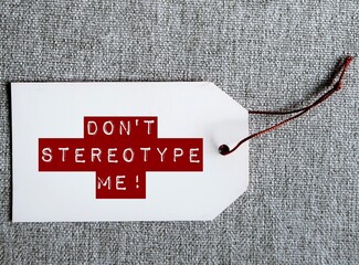 White tag with red text message - Don't stereotype me! -  to stop stereotypes or generalization...